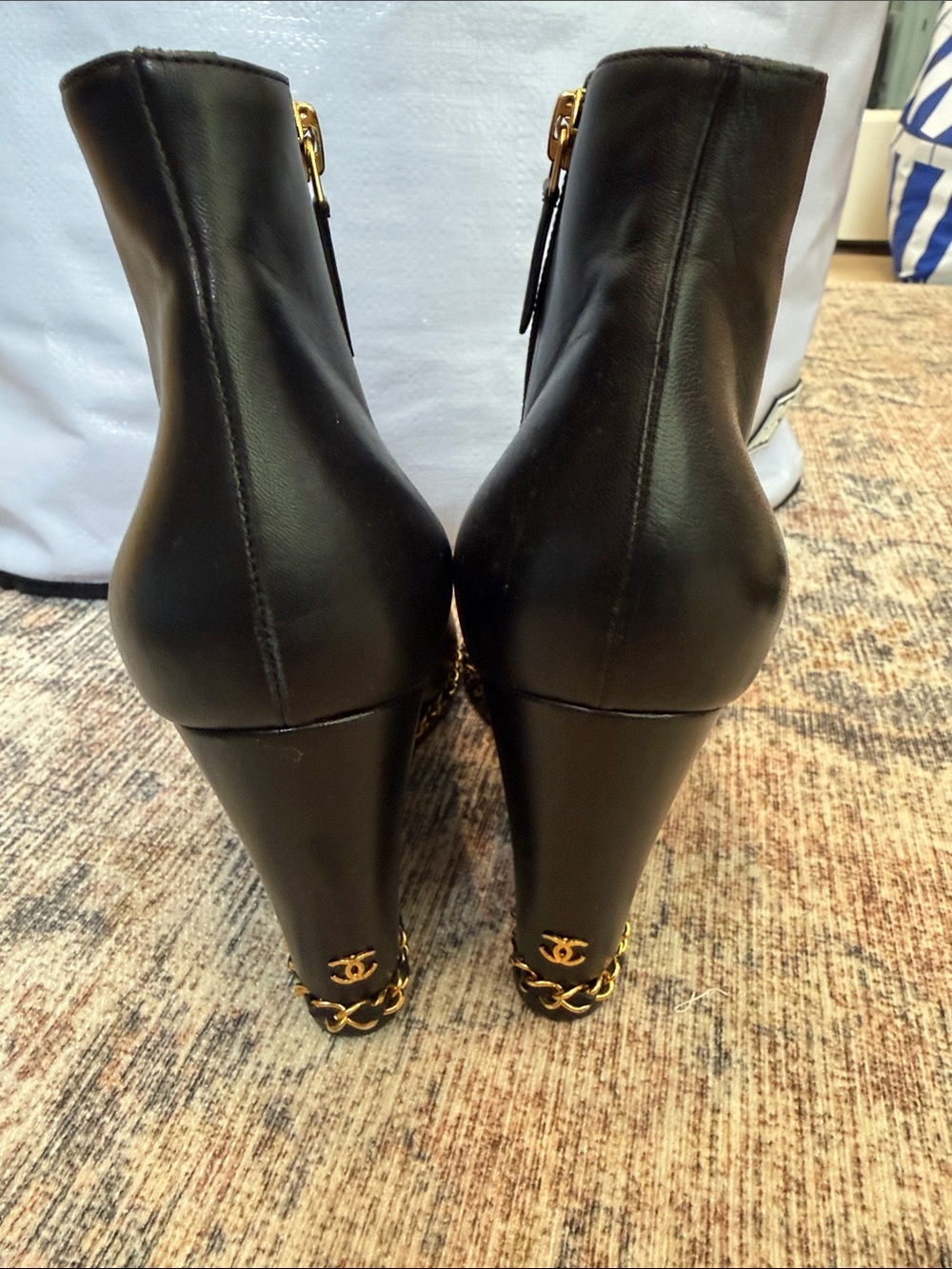 CHANEL Black Leather High Heel Ankle Boots with Gold CC Detail
